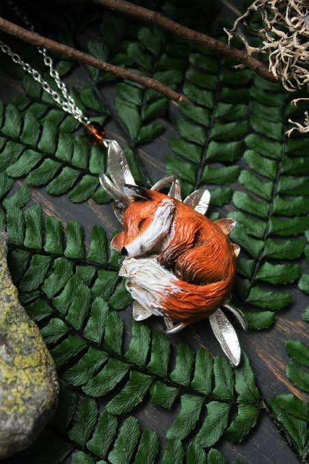 Fox Curled in a Leaf